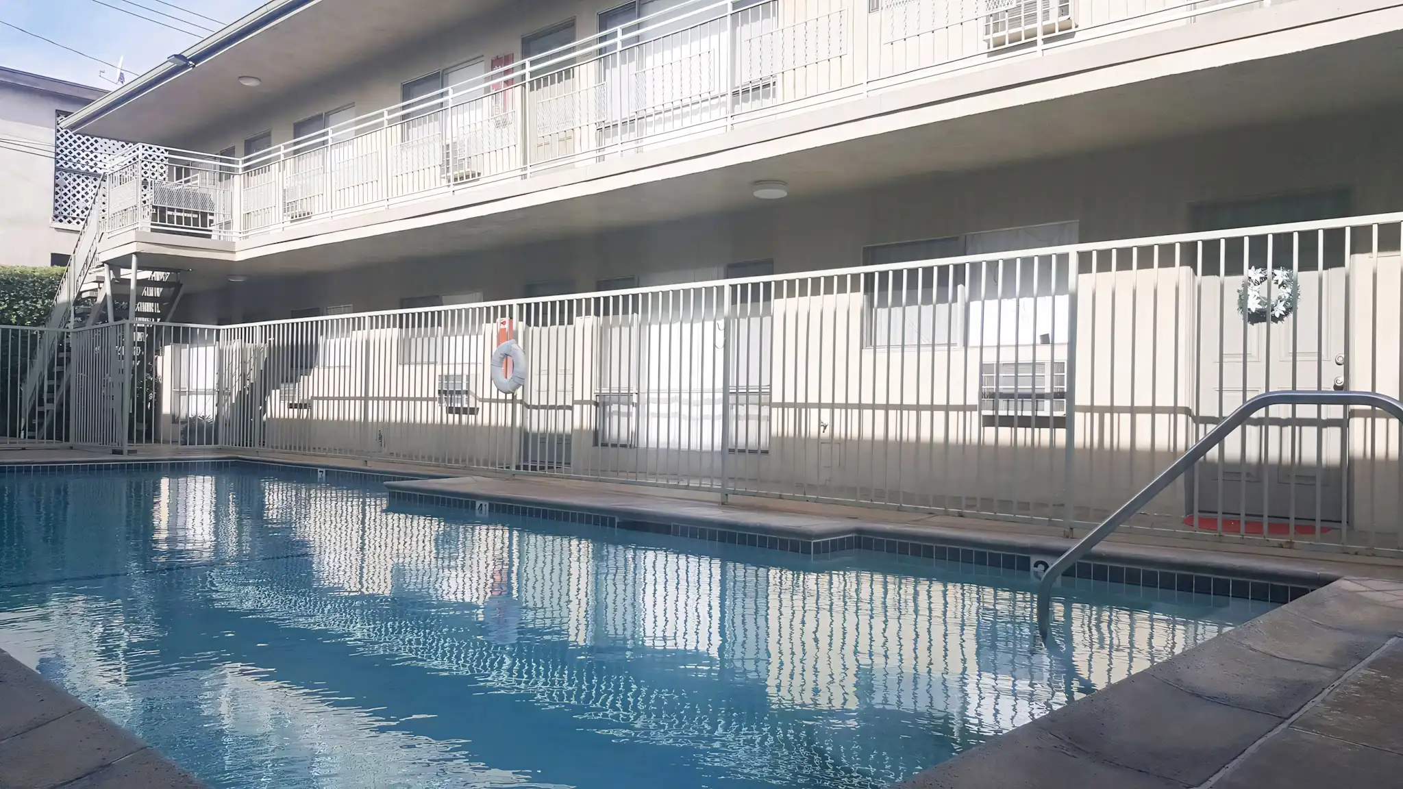 Palma Imperial II gated swimming pool and resident walkways