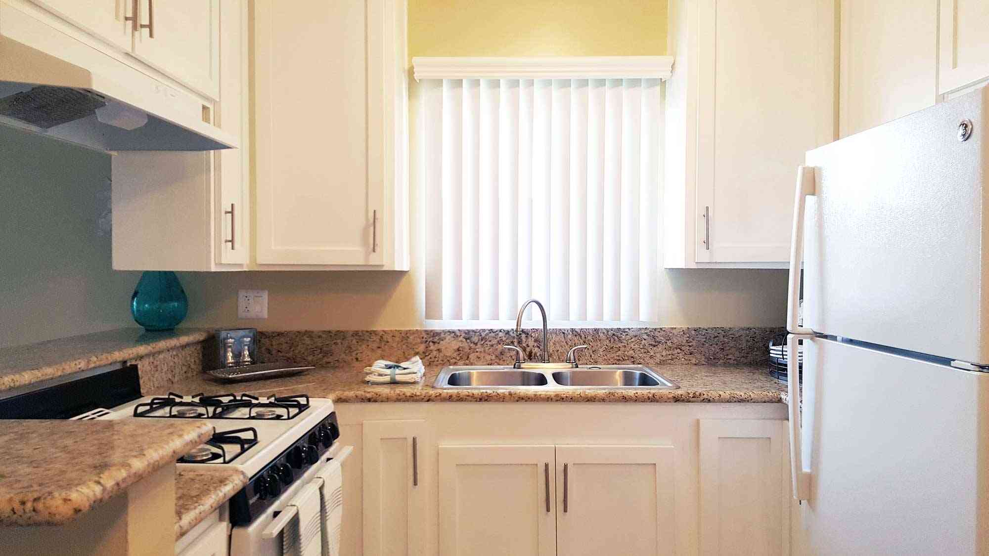 modern kitchen with white shaker cabinets