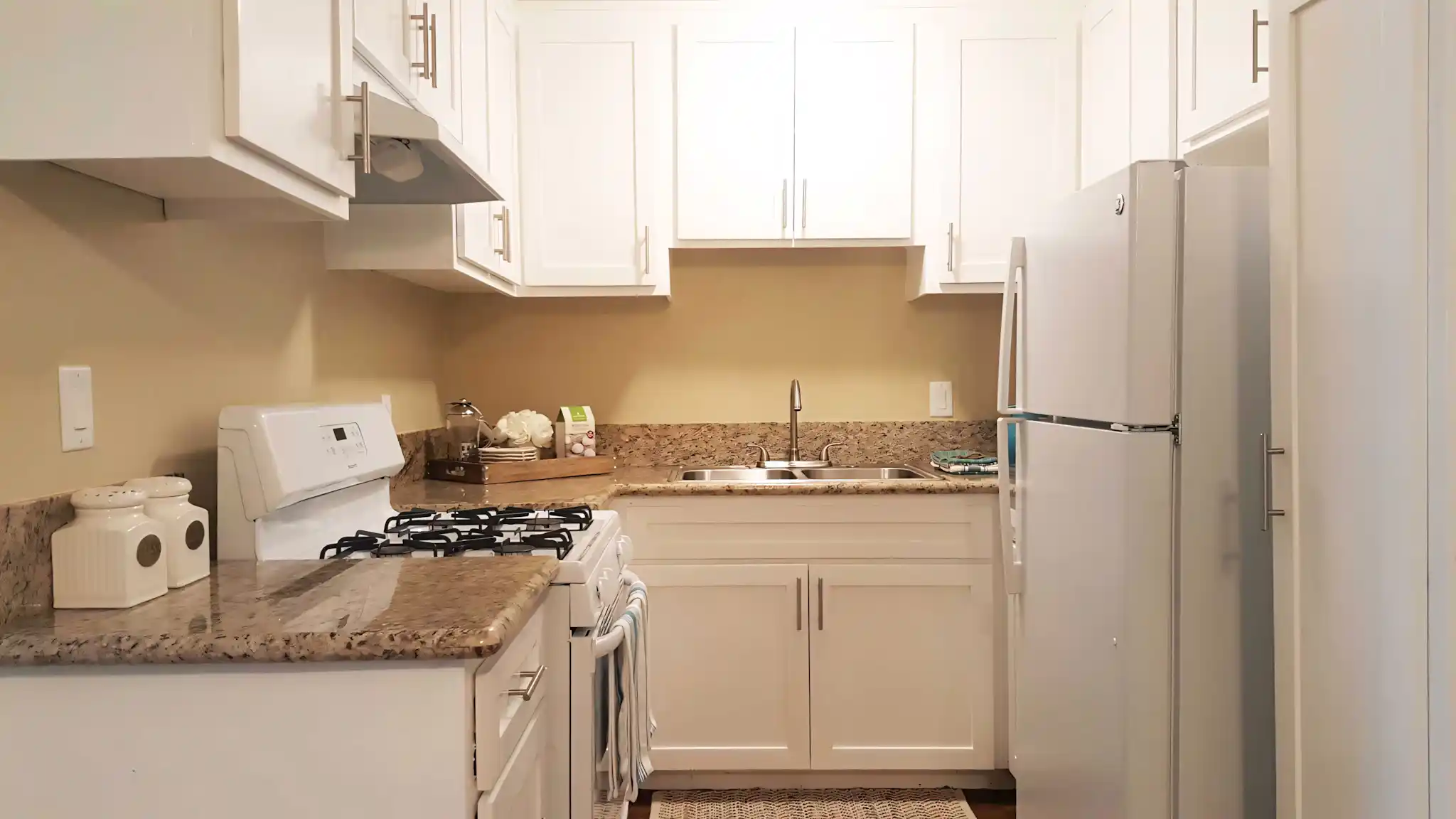 Palma Imperial I updated kitchen with white appliances and ample storage