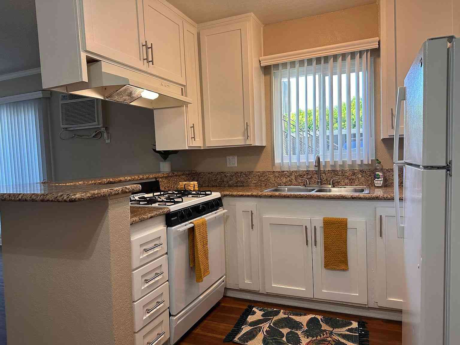 open concept kitchen with gas range