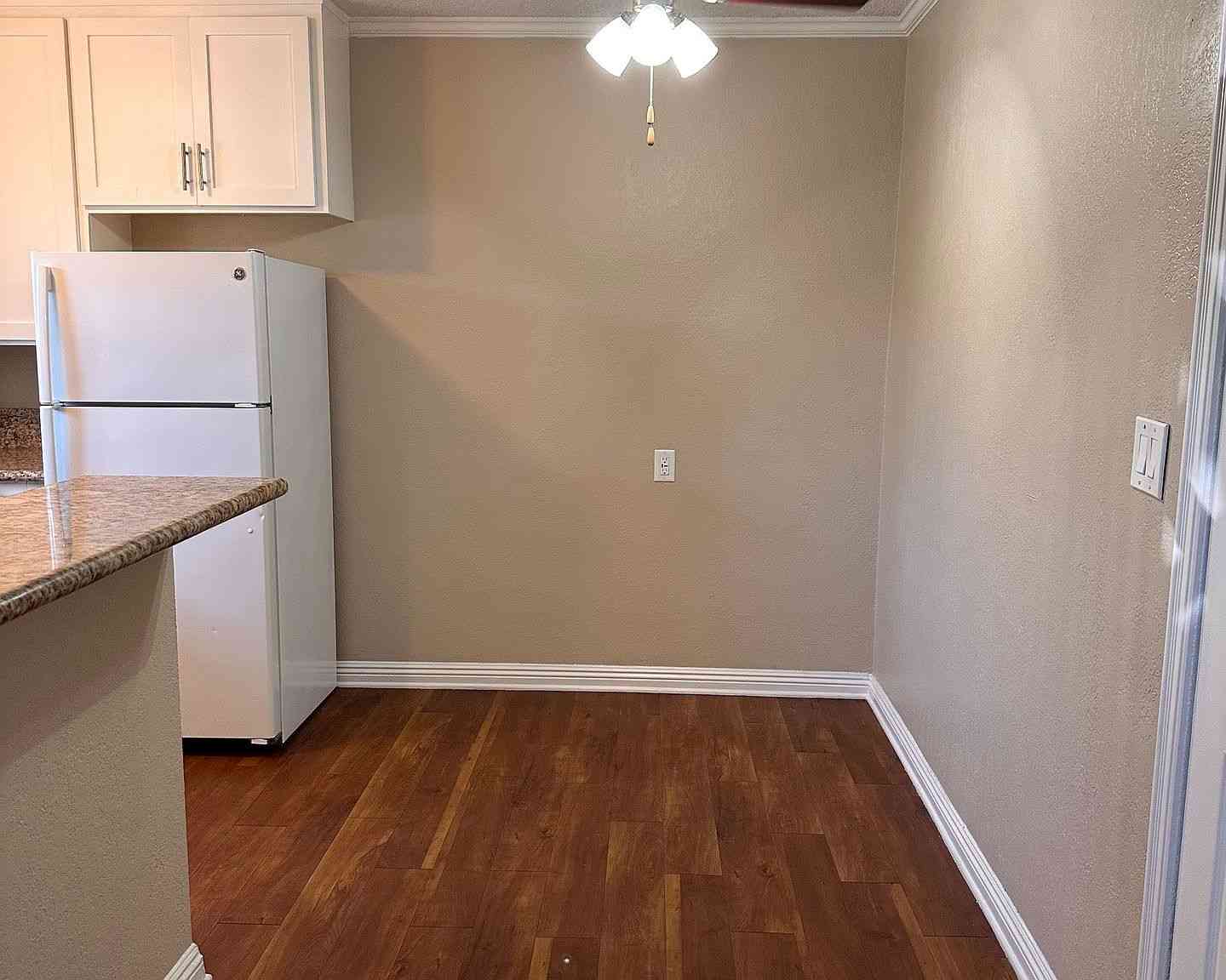 dedicated dining nook with hardwood style floors