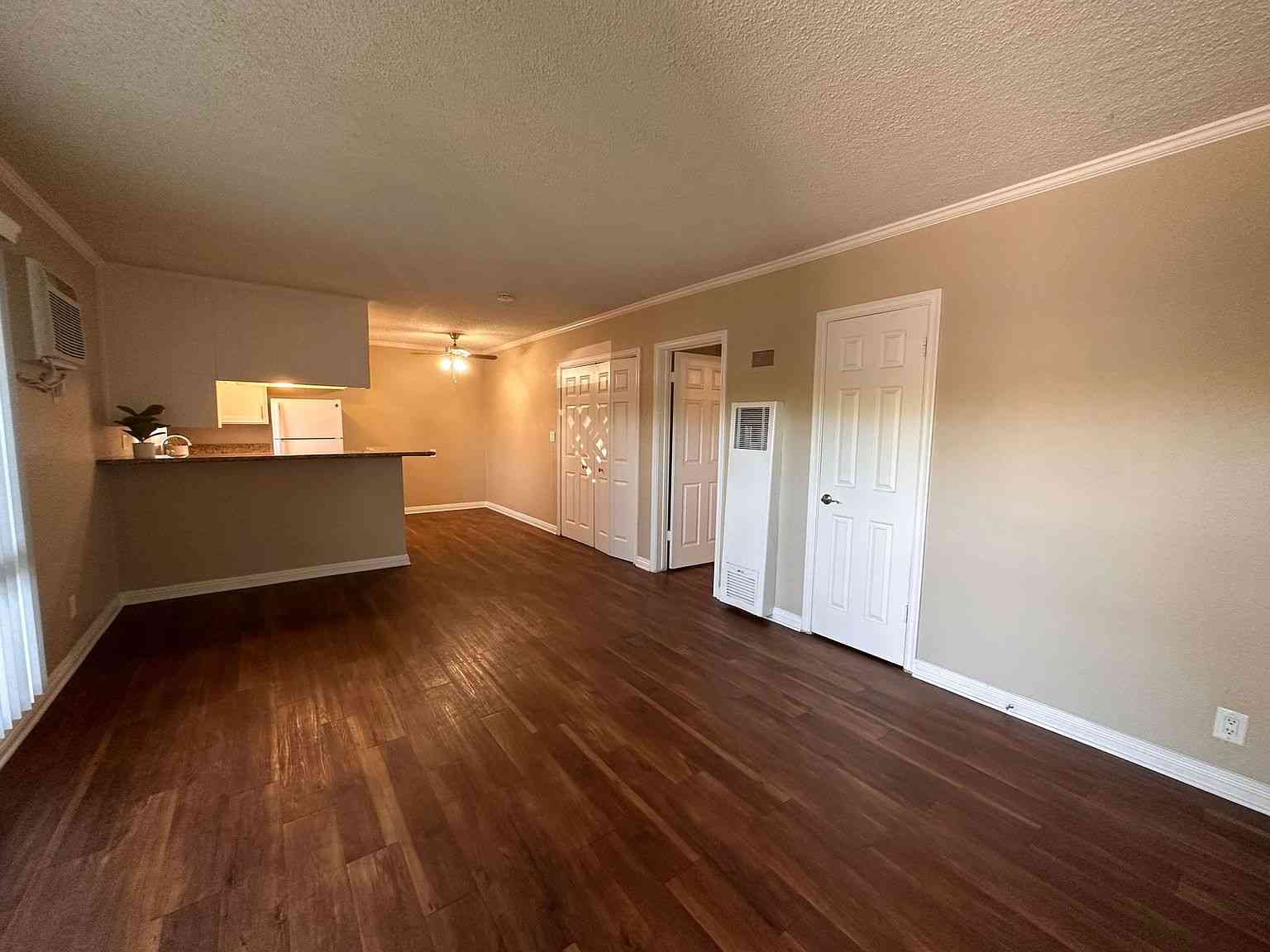 open concept living room with hardwood style floors