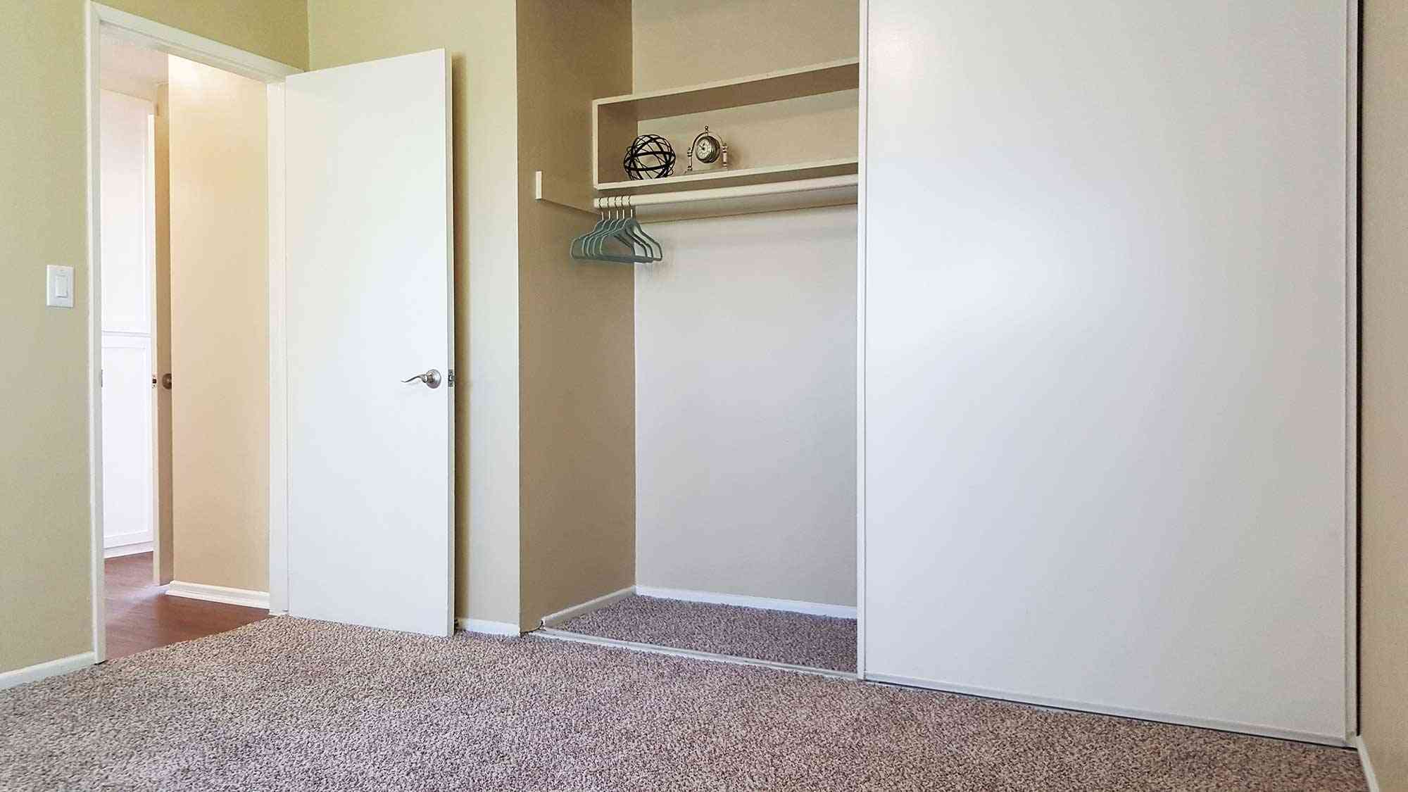 bedroom interior featuring sliding closet doors